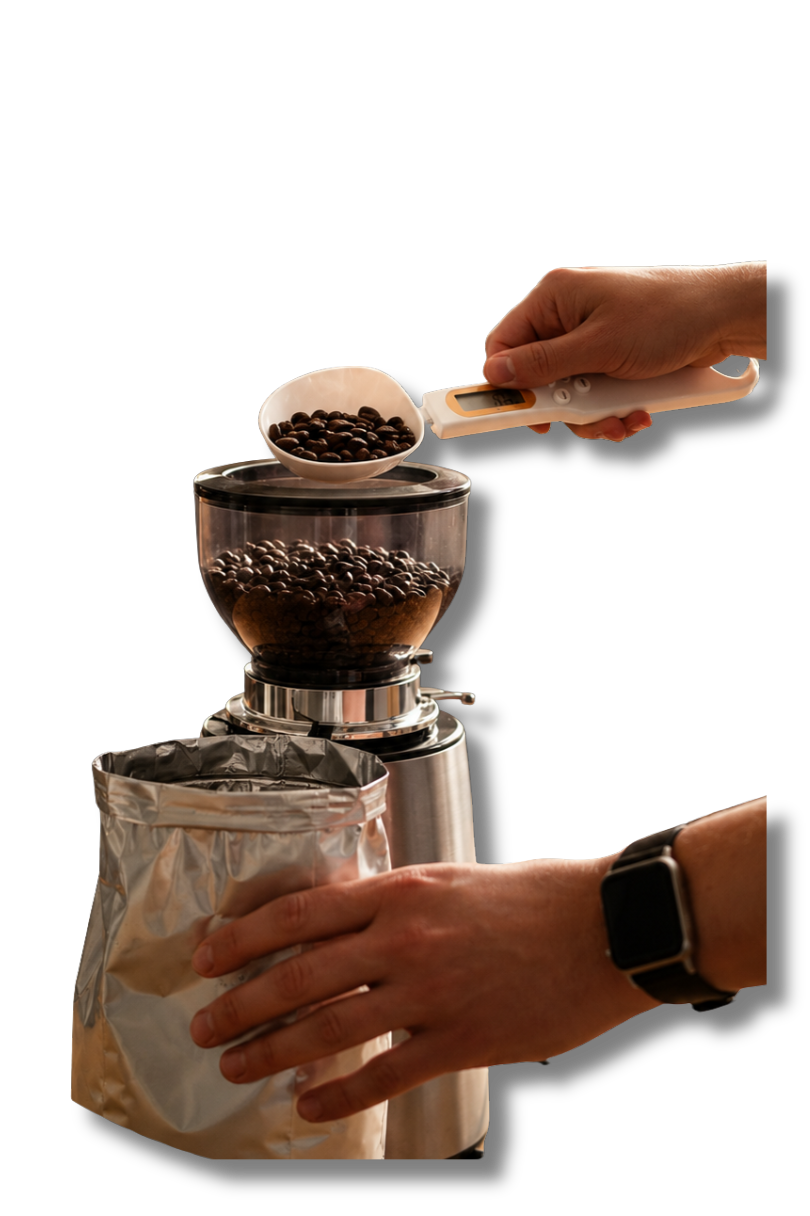 Digital spoon scale measuring coffee beans